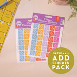 Corner planner stickers with a purple packaging on a beige surface, featuring colorful corner stickers.