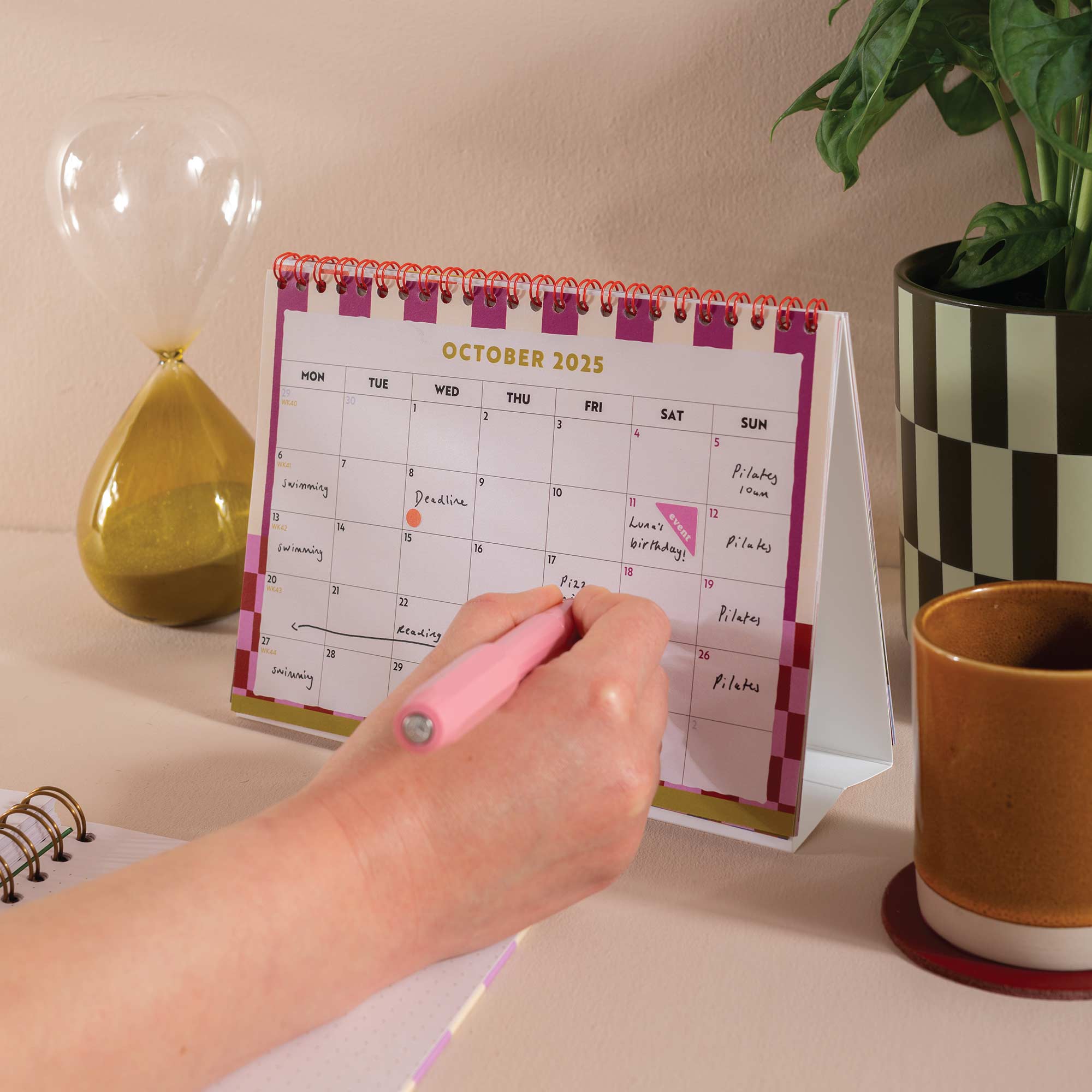 2025–2026 Academic Desk Calendar – Flip August Start displayed on a workspace desk with stationery