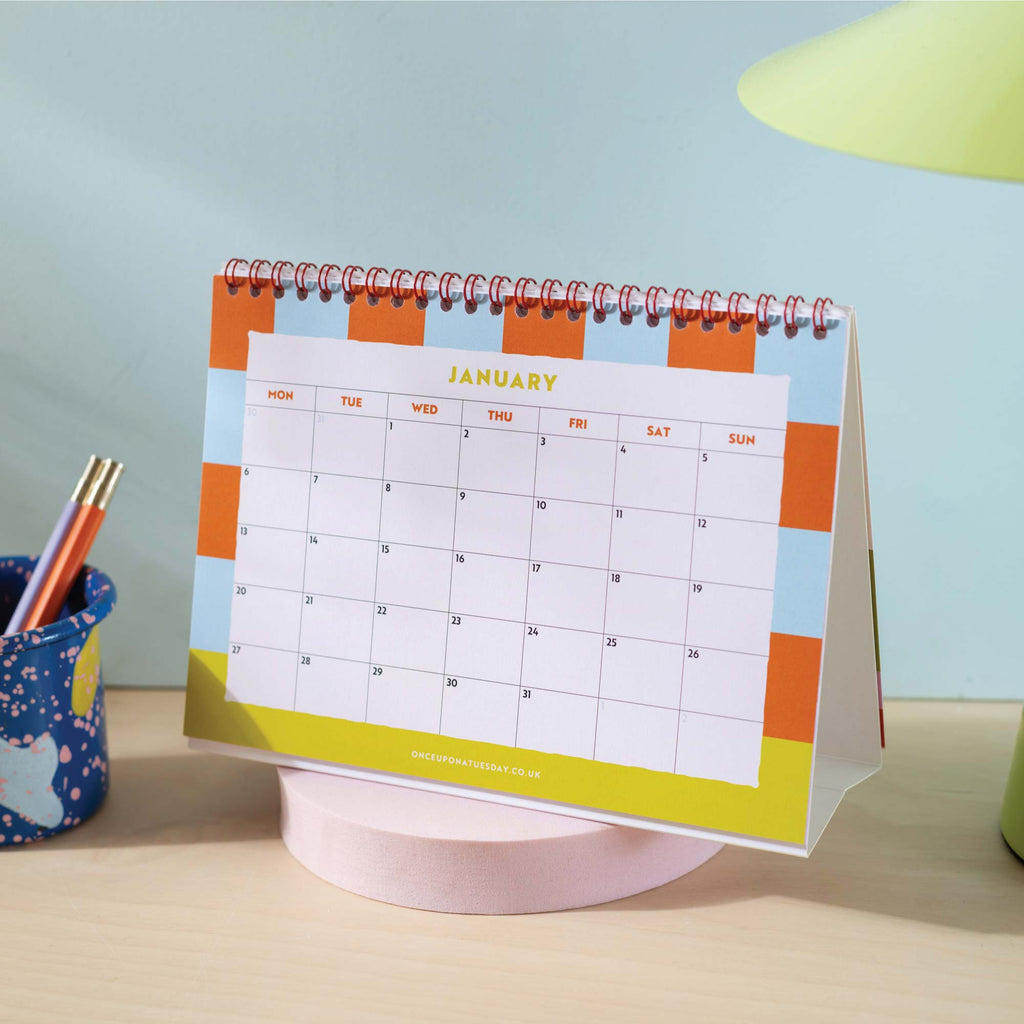 2025 desk calendar, A5 size. Bright Colours. Checks and Stripes. 100% Recycled Paper and made in the UK.