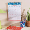 2025 colourful and compact calendar. recycled paper. made in the UK.