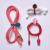 Kikkerland Inkerie magnetic cable clips close up, showing the magnetic clip mechanism