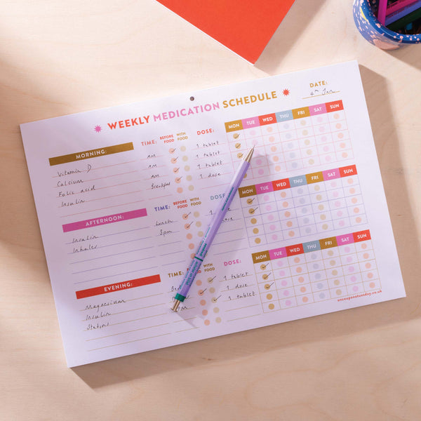 a4 colourful medication schedule and vitamin log. 100% recycled paper. 52 page planner pad.