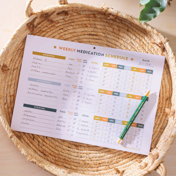 a4 colourful medication schedule and vitamin log. 100% recycled paper. 52 page planner pad.