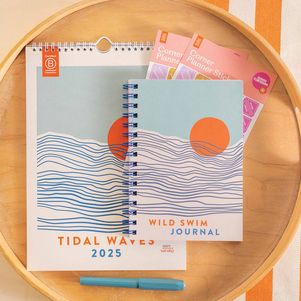 Tidal Waves gift set with 2025 ocean-themed calendar, wild swimming journal, teal pen, and planner stickers