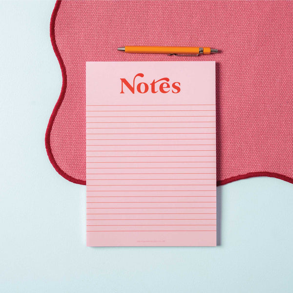 a5 recycled paper notepad in pink and red