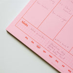 a4 vertical weekly planner in pink and red. 100% recycled paper. made in the UK. Magnetic Planner. Magnet Meal Planner