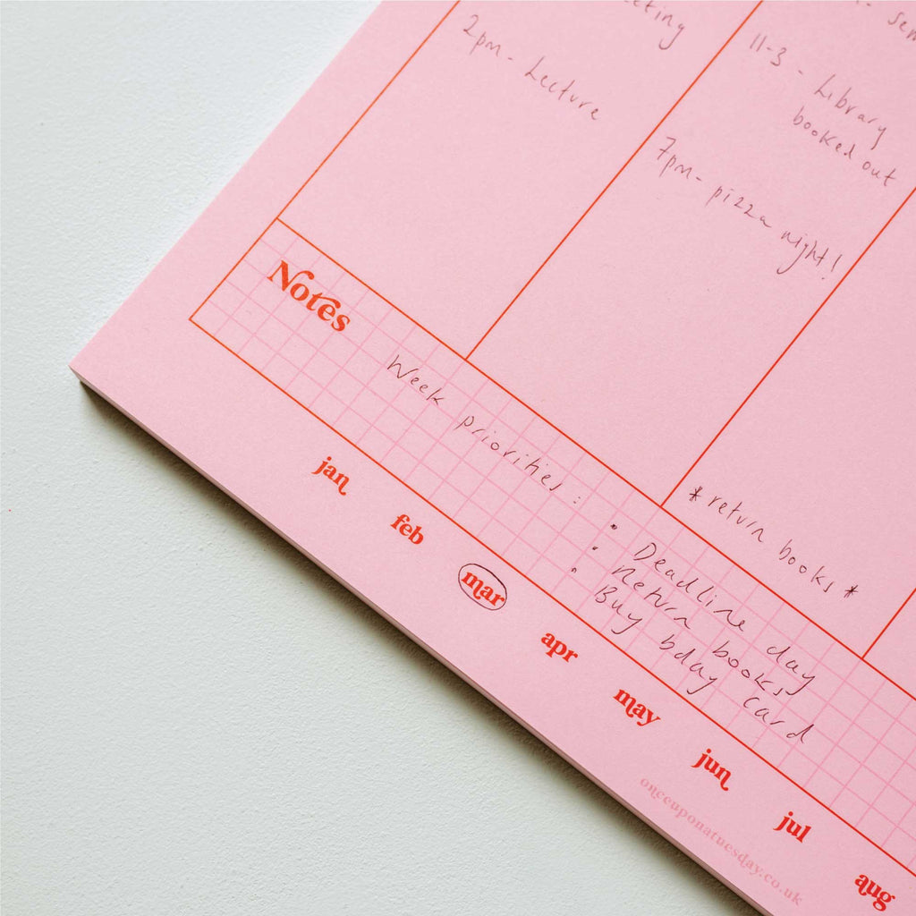 a4 vertical weekly planner in pink and red. 100% recycled paper. made in the UK.