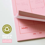 a4 vertical weekly planner in pink and red. 100% recycled paper. made in the UK.