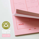 a4 vertical weekly planner in pink and red. 100% recycled paper. made in the UK.