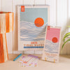 Family Waves gift set with 2025 family planner, birthday calendar, teal pen, and family stickers