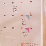 Close-up of monthly layout in the 2025–2026 Simply Bright A4 Wall Calendar, showcasing week numbers, UK & US holidays, and moon phases