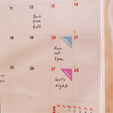 Close-up of monthly layout in the 2025–2026 Simply Bright A4 Wall Calendar, showcasing week numbers, UK & US holidays, and moon phases