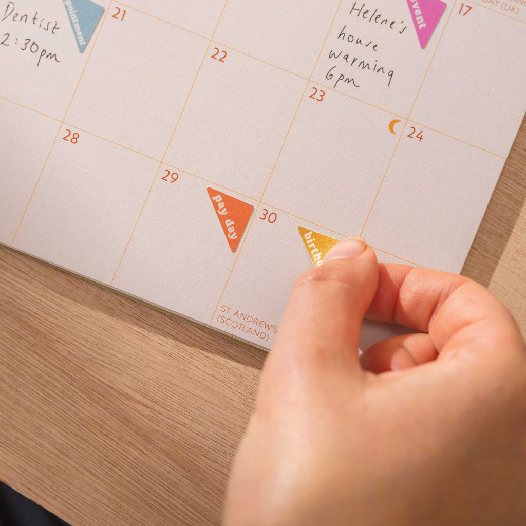 Colourful corner stickers in use on calendar grid. Level up your planning in 2026.