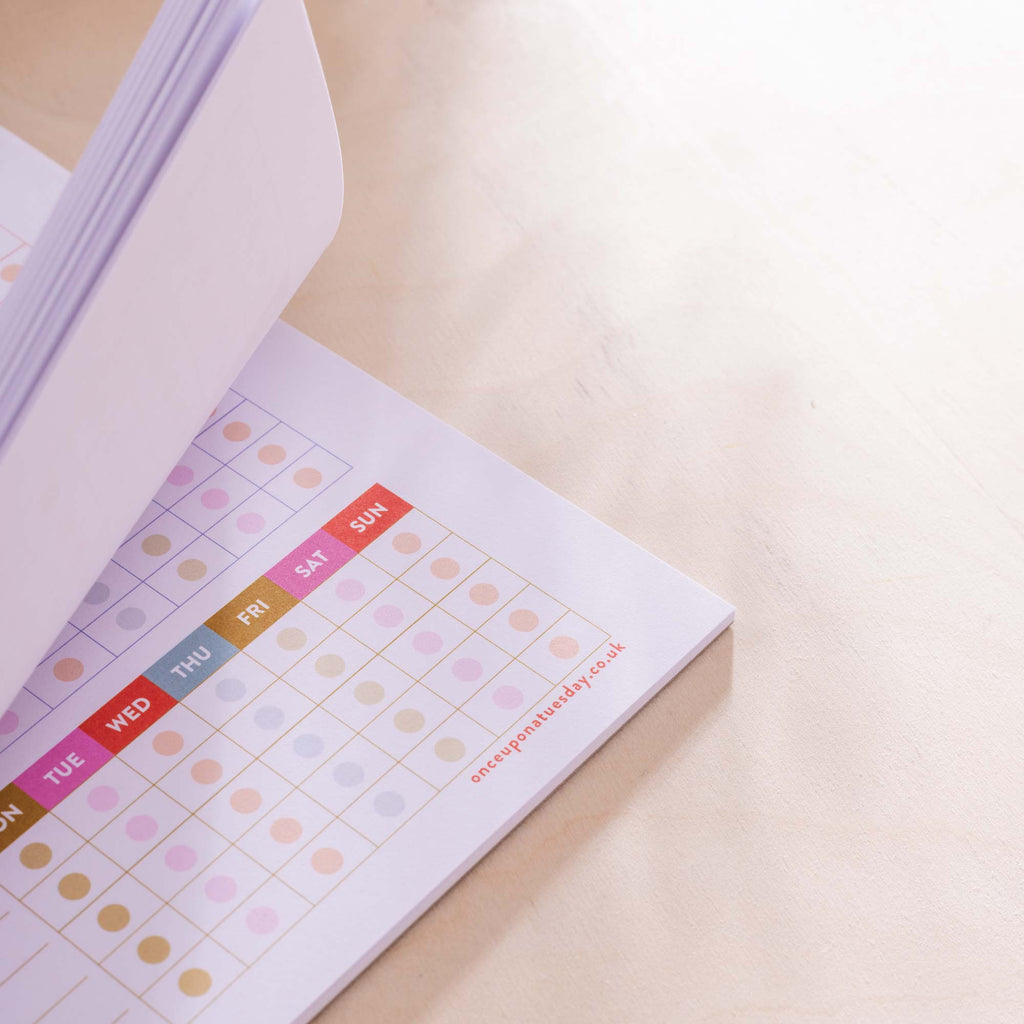 a4 colourful medication schedule and vitamin log. 100% recycled paper. 52 page planner pad.