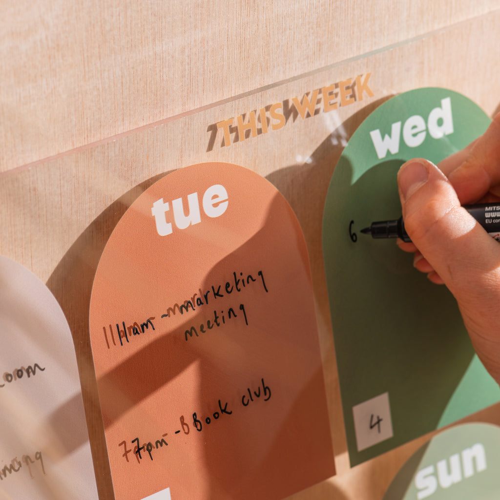 A4 landscape wipeable acrylic weekly planner in muted arches. 100% Greencast Recycled Acrylic. Design and printed in the UK.