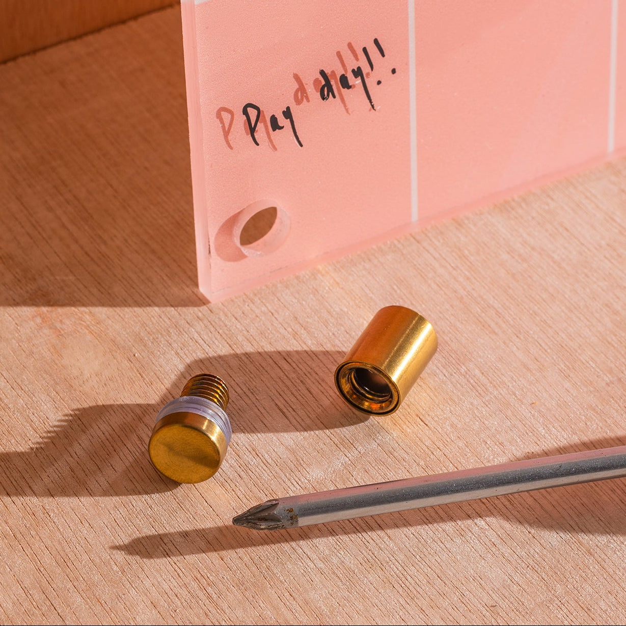 A3 portrait wipeable acrylic weekly planner in peach. 100% Greencast Recycled Acrylic. Design and printed in the UK.