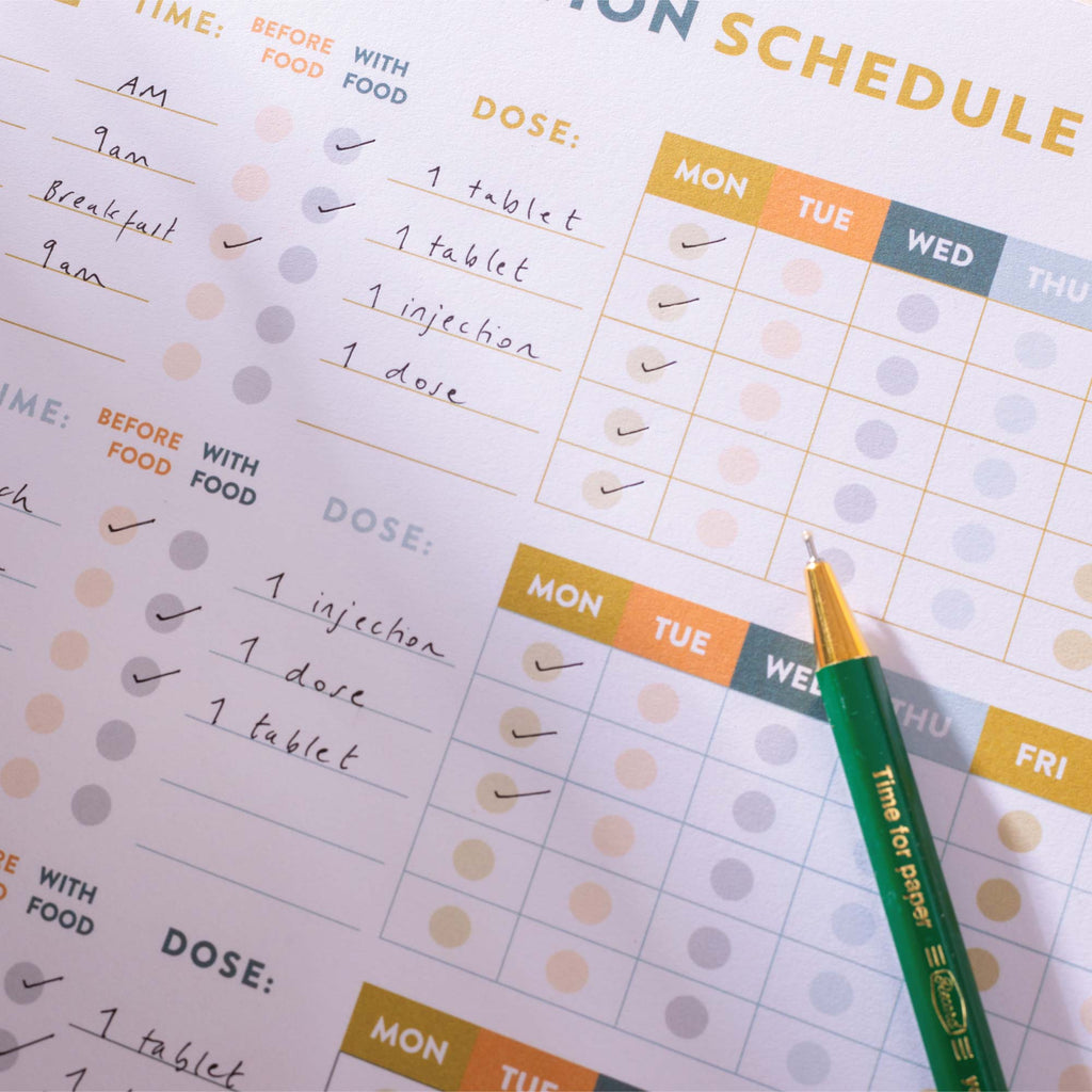 a4 colourful medication schedule and vitamin log. 100% recycled paper. 52 page planner pad.