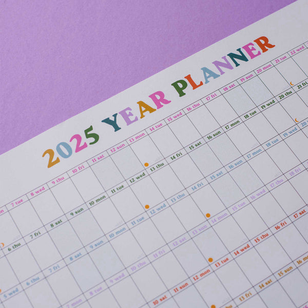 49x70cm colourful 2025 wall planner. 100% recycled paper and made in the UK.