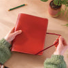 A5 filofax style refillable binder made from recycled leather. handmade in the UK.