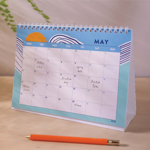 academic year 2024-2025 desk calendar, A5 size. Minimalist ocean inspired design. 100% Recycled Paper and made in the UK.