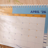 Close-up of monthly layout in the 2025–2026 Ocean Tidal Waves Desk Calendar, showcasing week numbers and spacious date boxes