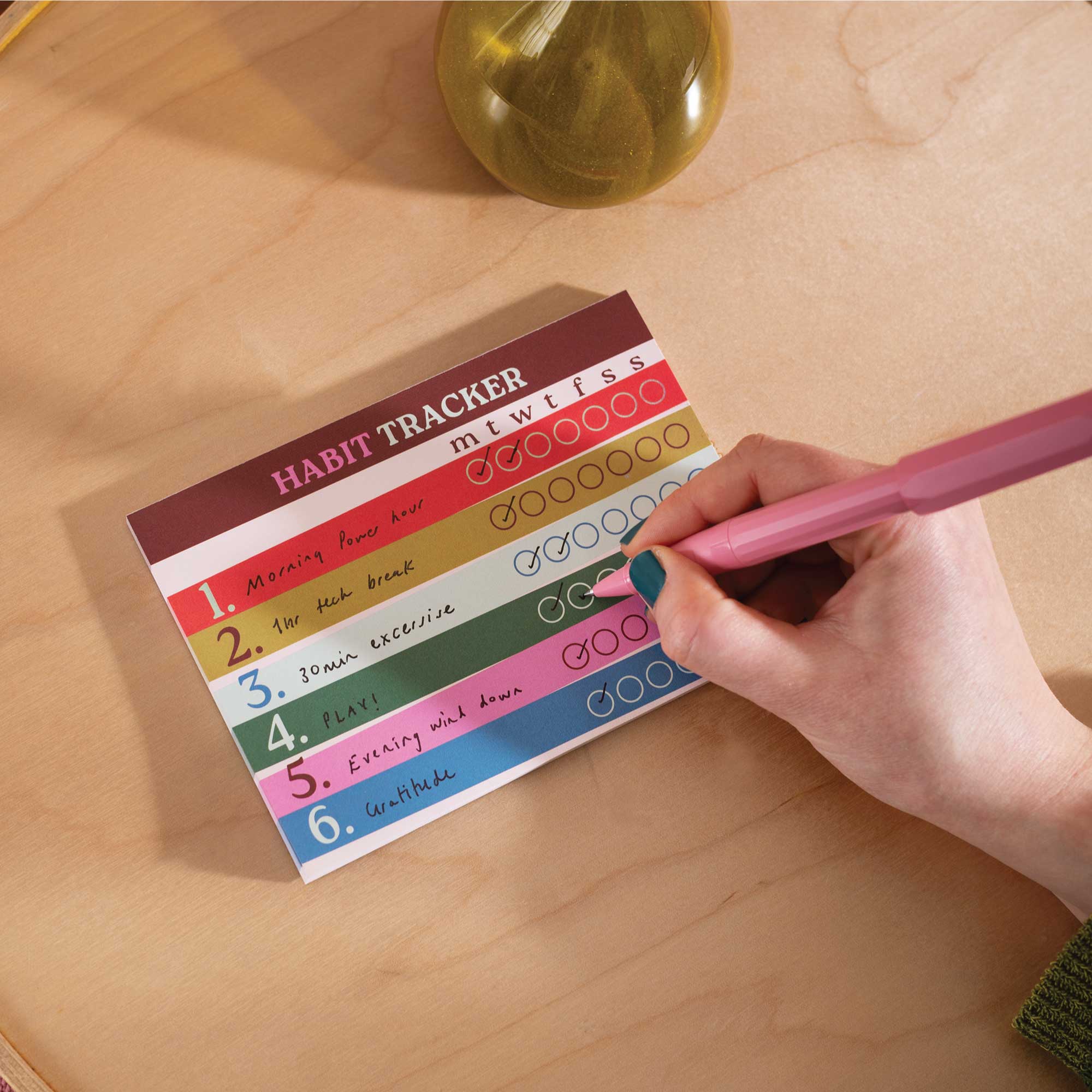 Undated habit tracker with space for seven habits and daily check-ins