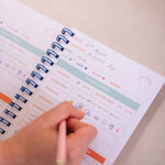 Tidal Flow gift set with swim journal, daily habit tracker, and teal rollerball pen