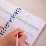 Tidal Flow gift set with swim journal, daily habit tracker, and teal rollerball pen