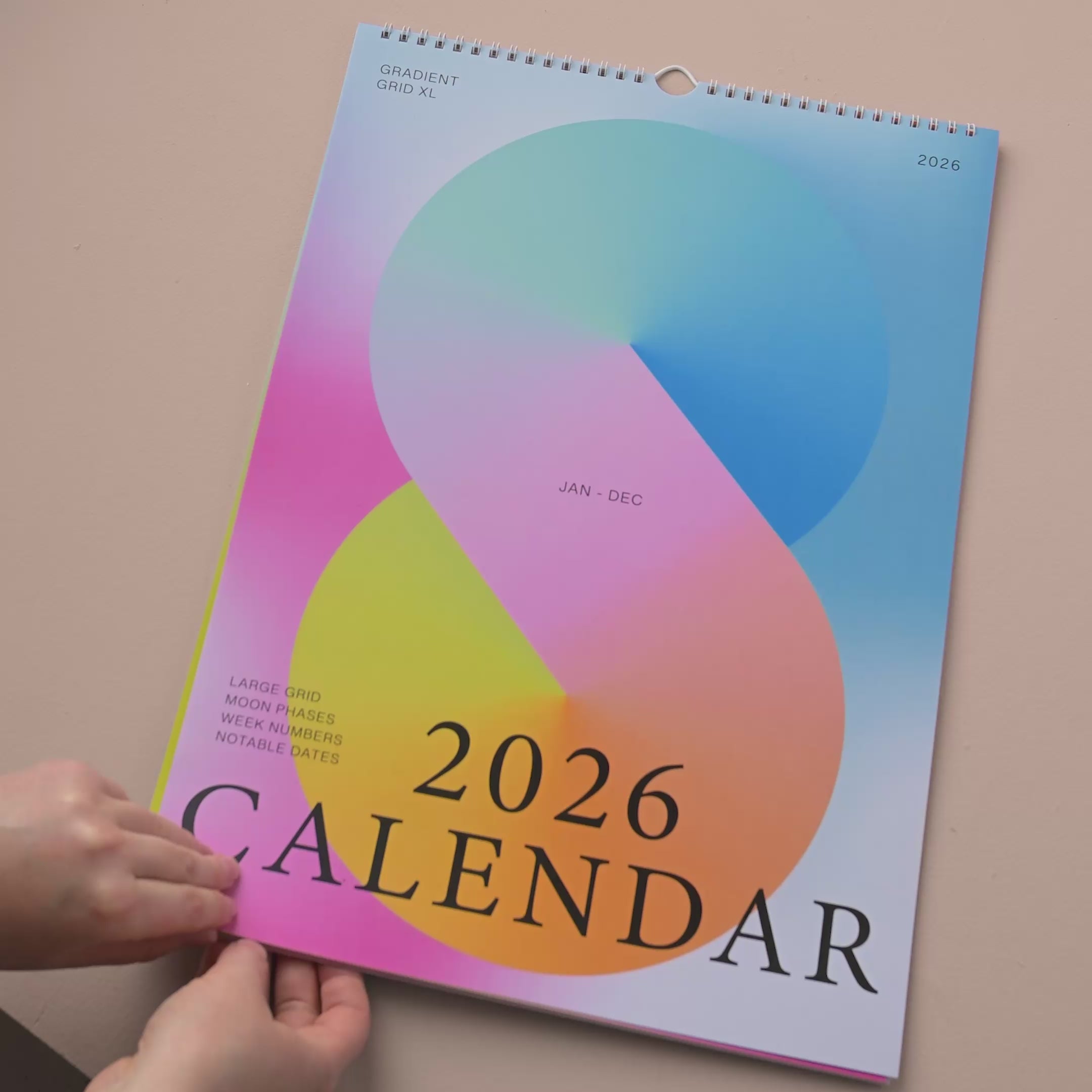 Good Tuesday's 2026 calendar with colorful gradient design. 100% recycled paper.