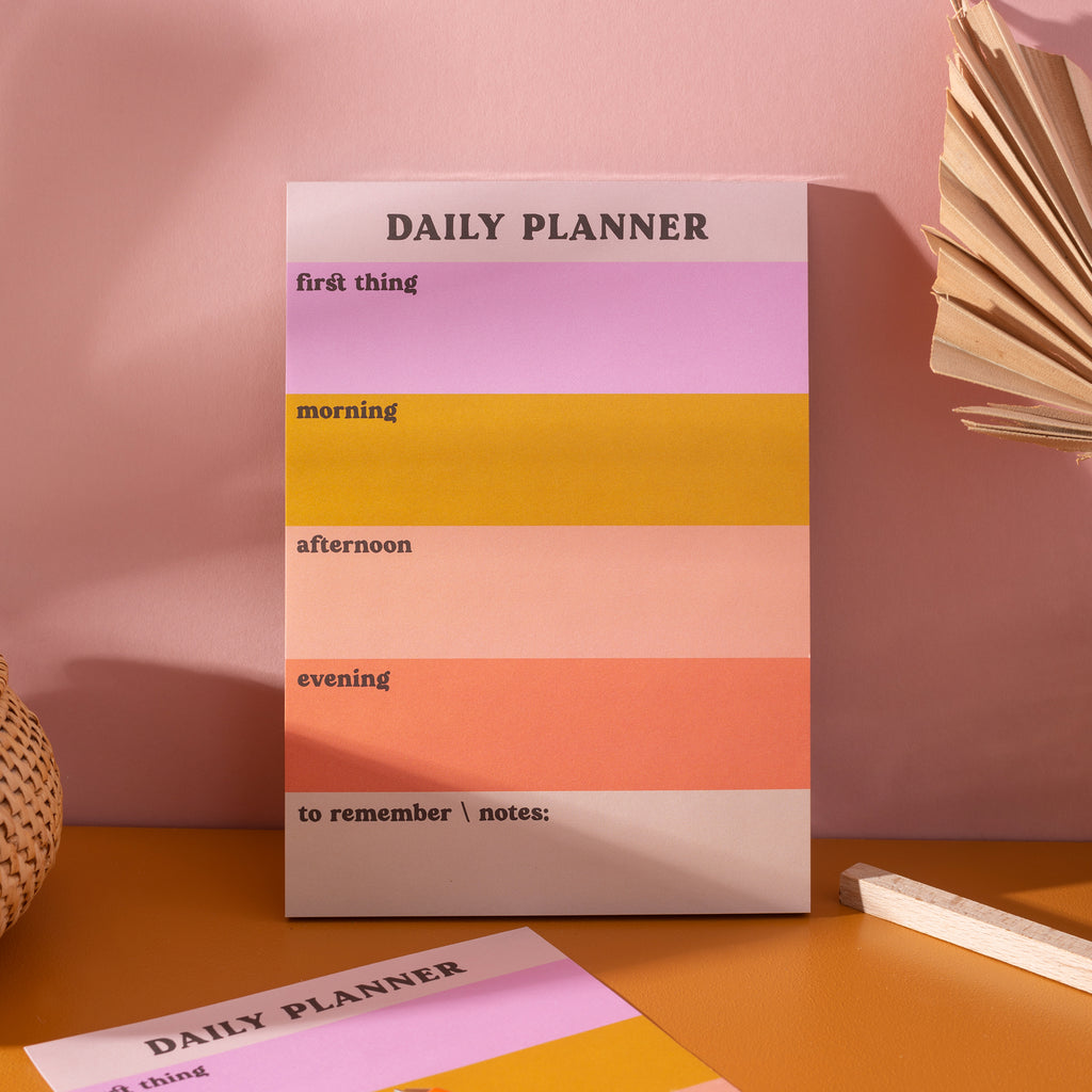 A5 Daily Planner Pad in Pastel Colour Block. This time blocking style desk pad helps organise your day with ease. 100% Recycled Paper. Made in the UK. ADHD daily planner.